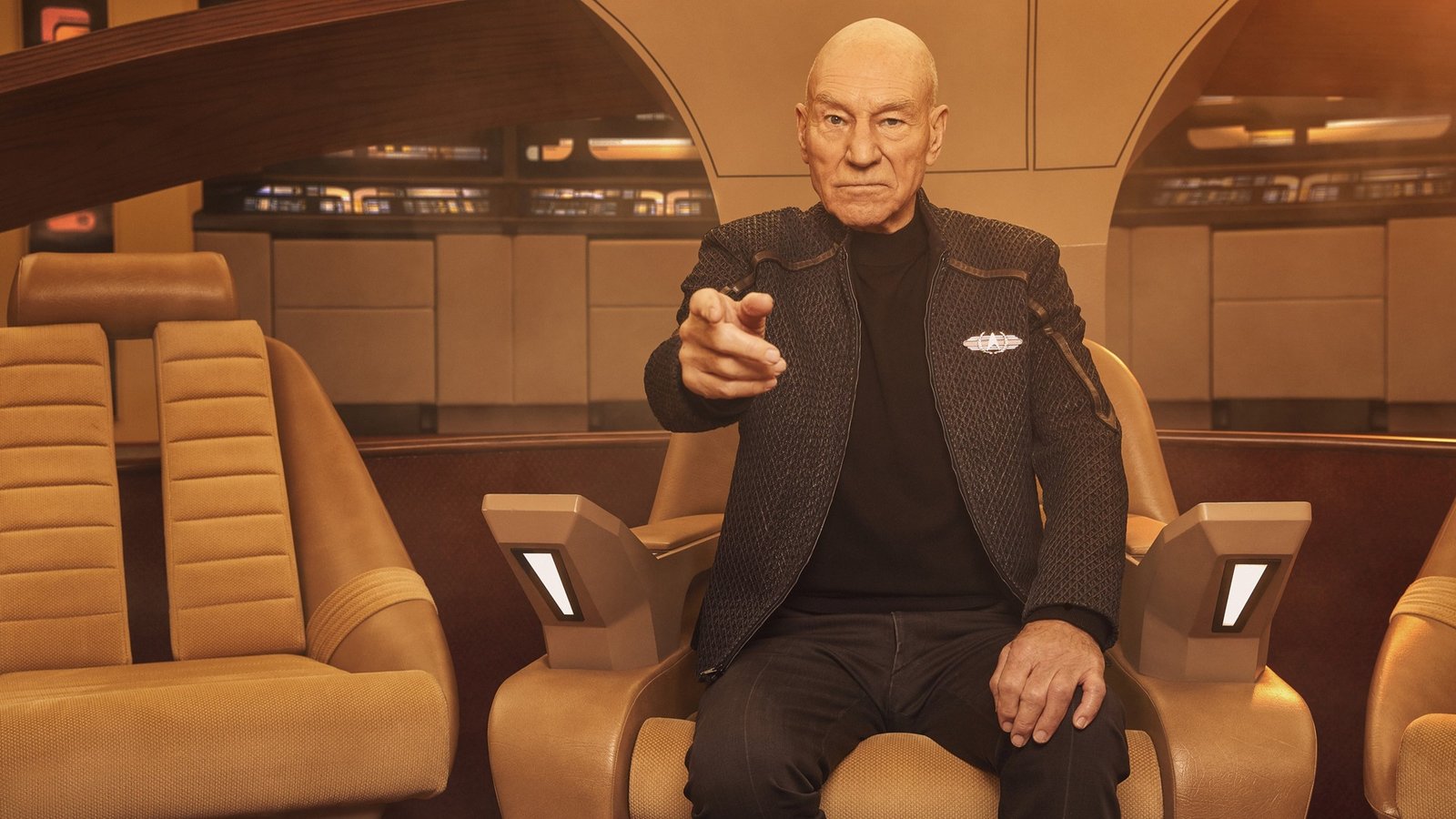 Patrick Stewart as Jean-Luc Picard in the captain's chair on the bridge of the Enterprise-D in Star Trek: Picard season three